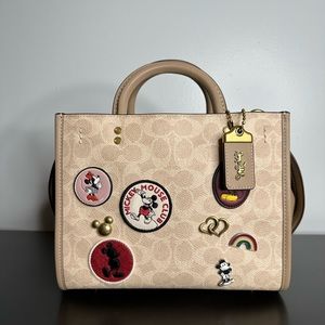 Disney Coach Rogue 25 bag